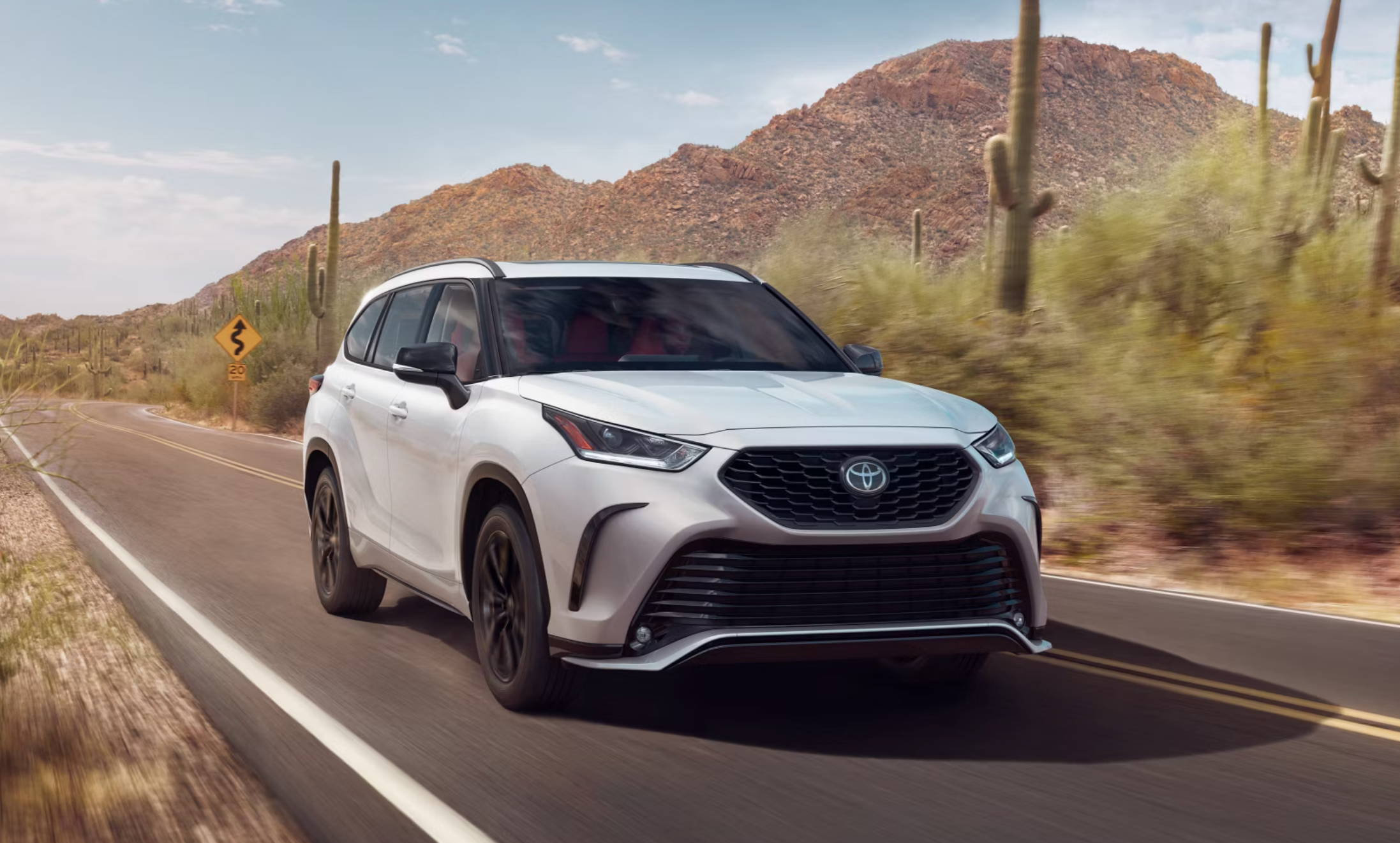 2025 Toyota Highlander on the highway
